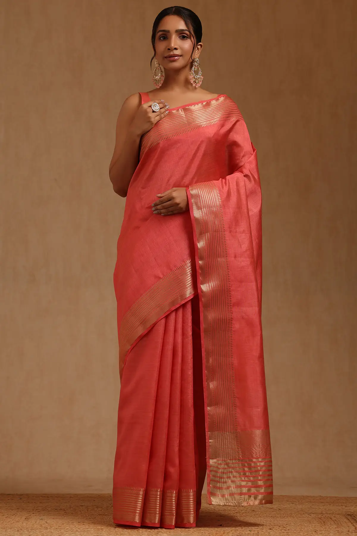 Peach Art Silk Solid Saree With Zari Woven Border